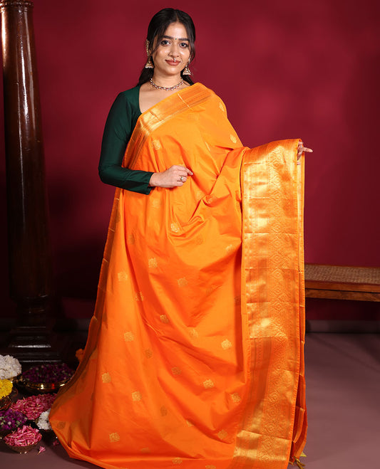 Orange Budget Silk Saree, Enthralled with Zari Buttas on Its Body, Highlighted by a Traditional Zari Design Border, Grandly Jaal-Patterned Pallu, and Paired with a Matching Blouse