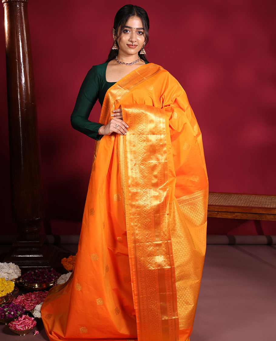 Orange Budget Silk Saree, Enthralled with Zari Buttas on Its Body, Highlighted by a Traditional Zari Design Border, Grandly Jaal-Patterned Pallu, and Paired with a Matching Blouse