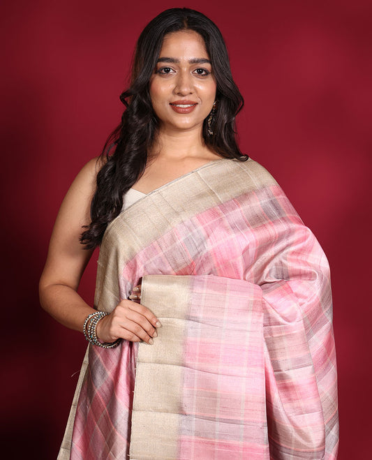 Pink Fancy Tussar Saree, Beautifully Bedecked with Checked Designs Printed on Its Body, Complemented by Contrast Textured Border, Patola Printed Pallu, and Paired with a Matching Printed Blouse
