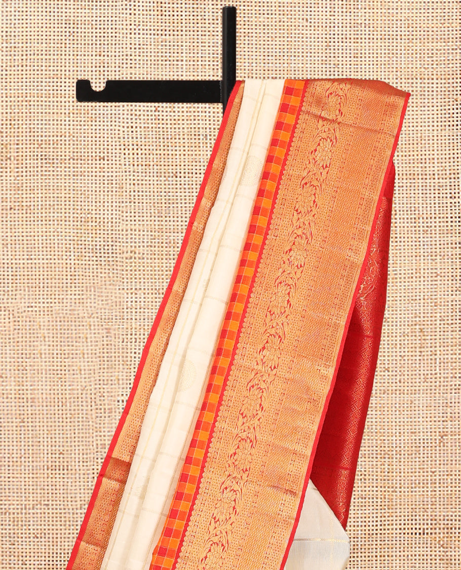 Cream Samudrika Silk Saree, Meticulously Crafted with Zari Butta Enclosed Checks, Contrast Checked Thazampoo Rekku Border of Kodi Visiry Designs, Grand Pallu, and a Contrast Blouse