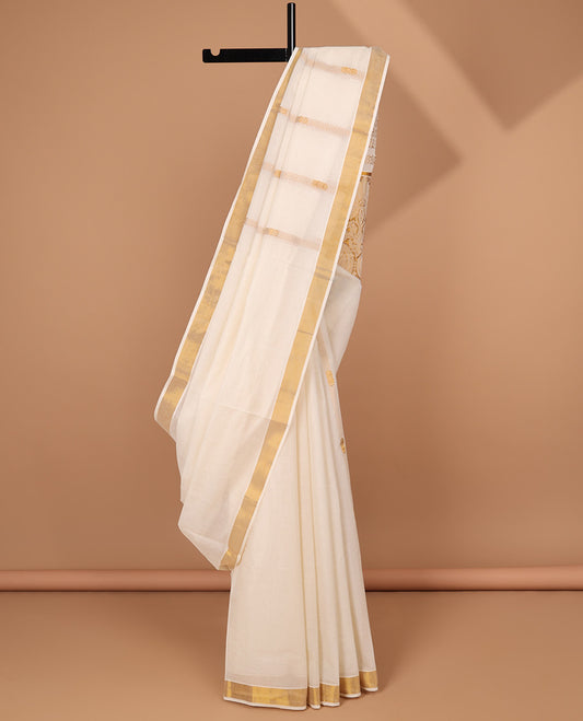 Cream kerala saree with zari stripes, zari border & pallu of floral & paisley designs