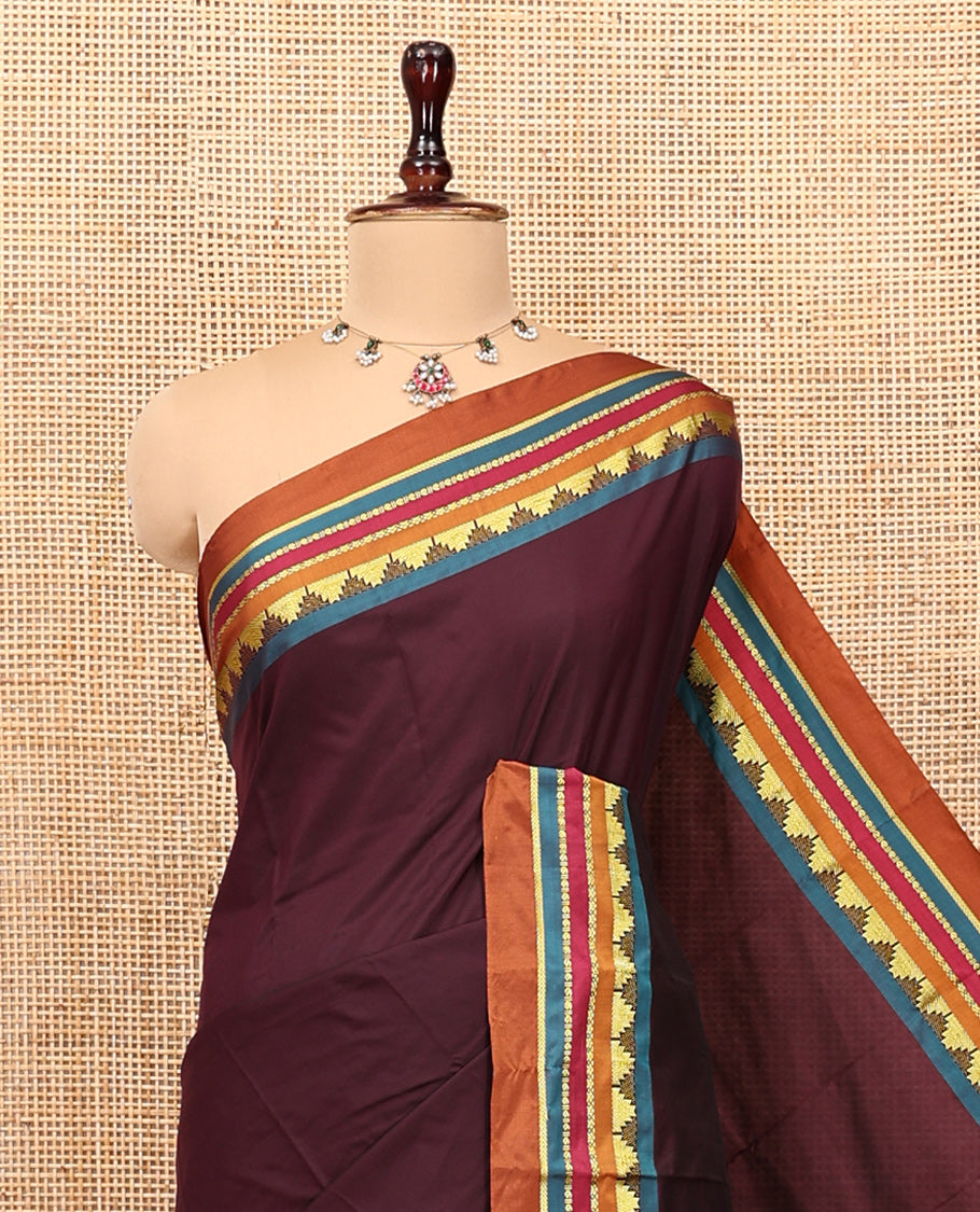Brown Plain Arani Gift Saree, Complemented by a Contrast Traditional Zari Border, a Zari Striped Pallu, and a Contrast Blouse