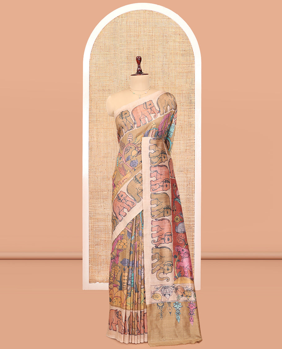 Brown Fancy Tussar Saree Features Kalamkari Floral and Animal Print, Contrast Elephant Border, Kalamkari Pallu, and a Contrast Blouse