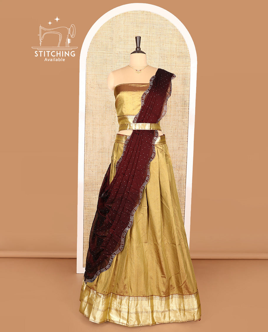 Gold Art Silk Half-Saree Featuring Plain Skirt, Adorned with a Contrast Traditional Zari Design Border, Paired with a Matching Blouse, and Contrast Stone Work Scallop-Bordered Dhavani