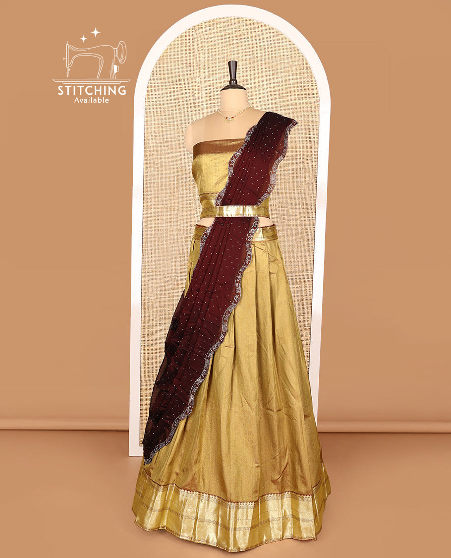 Gold Art Silk Half-Saree Featuring Plain Skirt, Adorned with a Contrast Traditional Zari Design Border, Paired with a Matching Blouse, and Contrast Stone Work Scallop-Bordered Dhavani