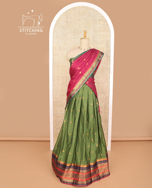 Dark green floral buttas art silk half saree with contrast zari design border, zari design blouse & floral design dhavani