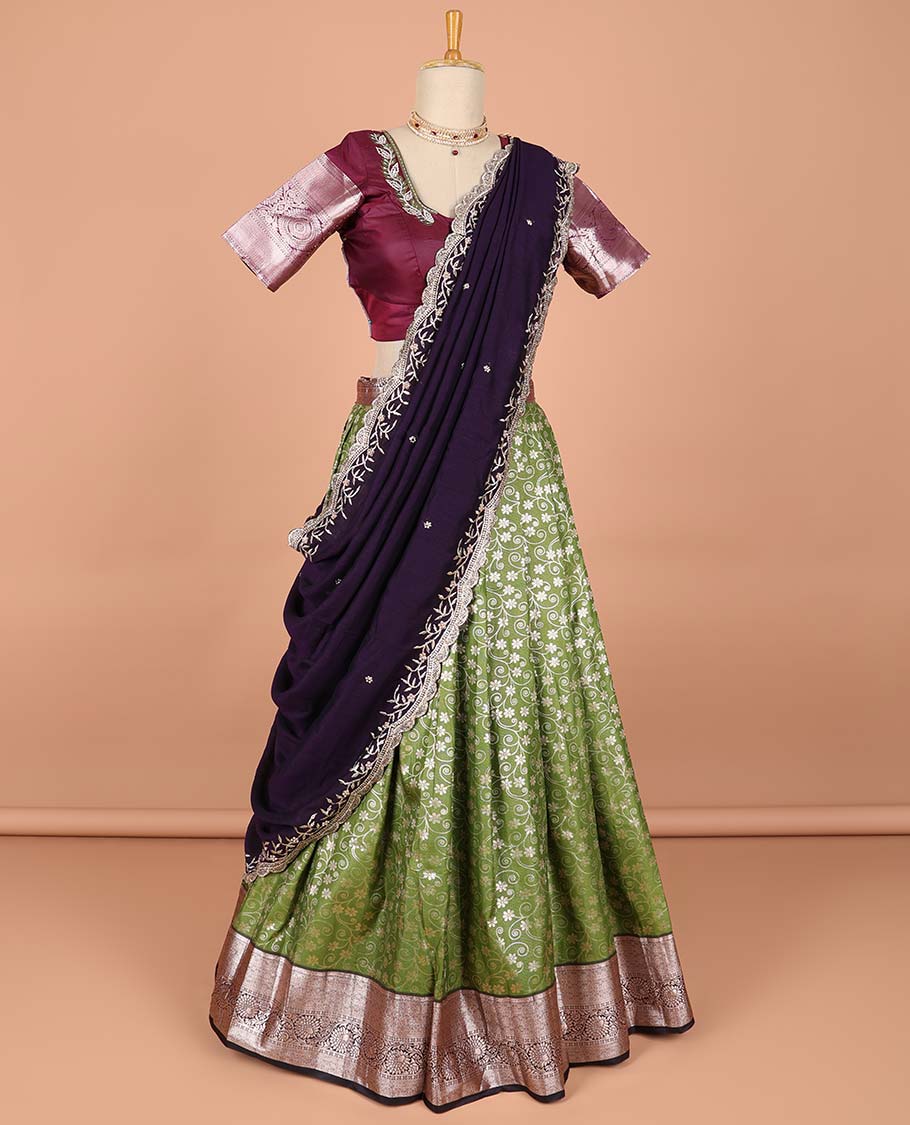 Green floral jacquard semi-stitched half saree with embroidered blouse & scallop border dhavani