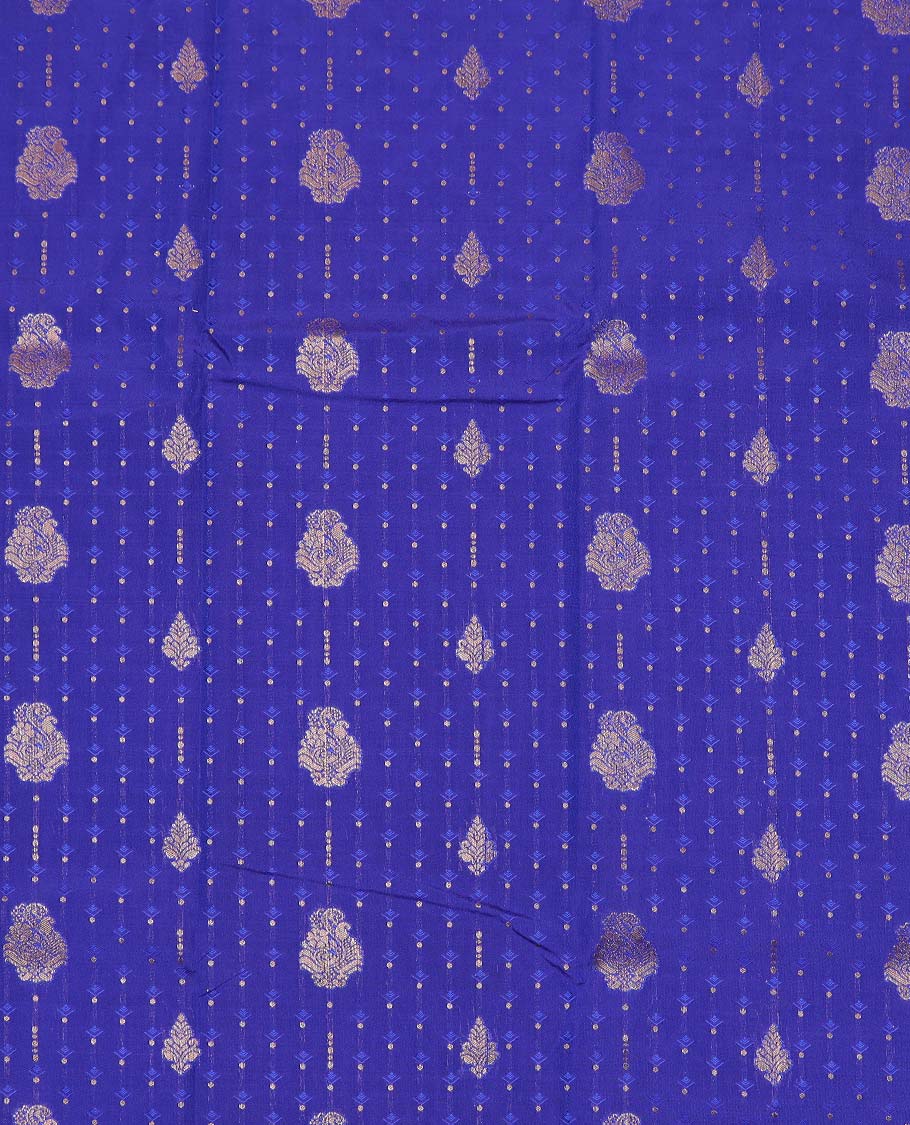 Navy blue art silk pavadai material, embossed with zari buttas woven skirt, contrast traditional zari border, and blouse