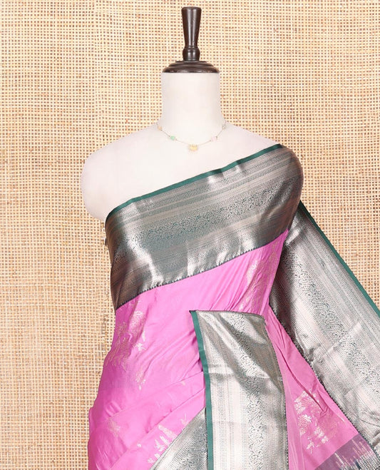 Pink Budget Silk Saree, Decked Up with Zari Buttas on Its Body, Complemented by a Contrast Traditional Zari Design Border, Chevron Zari Striped Pallu, and Paired with a Contrast Blouse