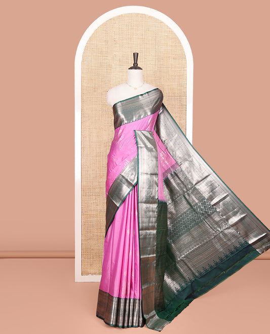 Pink Budget Silk Saree, Decked Up with Zari Buttas on Its Body, Complemented by a Contrast Traditional Zari Design Border, Chevron Zari Striped Pallu, and Paired with a Contrast Blouse