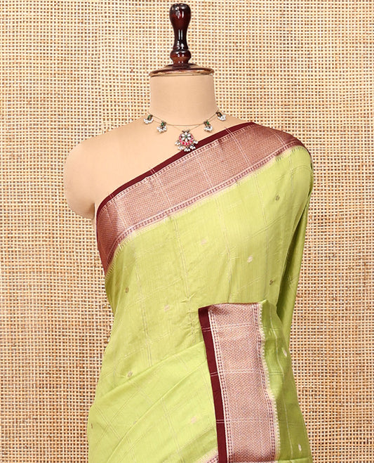 Green Assam Silk Saree, Adorned with Butta Enclosed Checks, Complemented by Contrast Traditional Zari Border, Gleaming Pallu, and Contrast Blouse