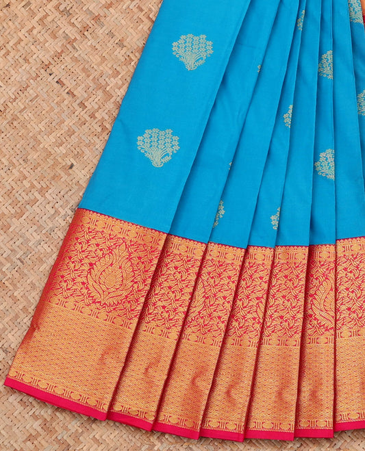Blue Budget Silk Saree, Adorned with Zari Buttas on Its Body, Complemented by Contrast Border of Traditional Zari Designs, Pallu of Floral Designs, and Paired with a Contrast Blouse