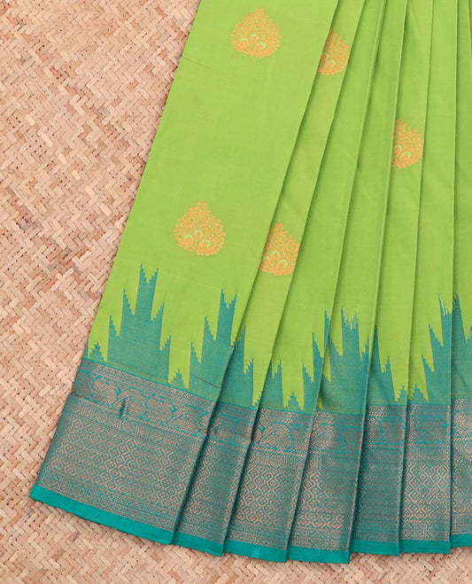 Green Budget Silk Saree, Adorned with Buttas All Over Its Body, Complemented by a Contrast Temple Traditional Zari Design Border, Geometric-Patterned Pallu, and Paired with a Contrast Blouse