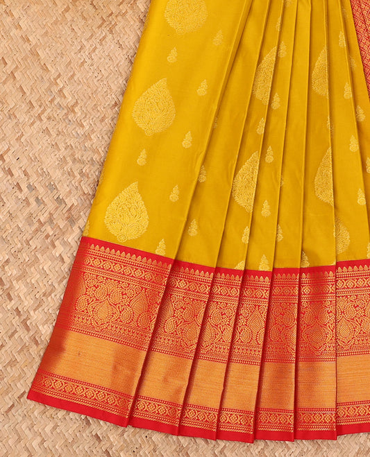 Mustard Budget Silk Saree Detailed with Zari Buttas, Highlighted with a Contrast Traditional Zari Design Border, Zari Woven Jaal Pallu, and Paired with a Contrast Blouse