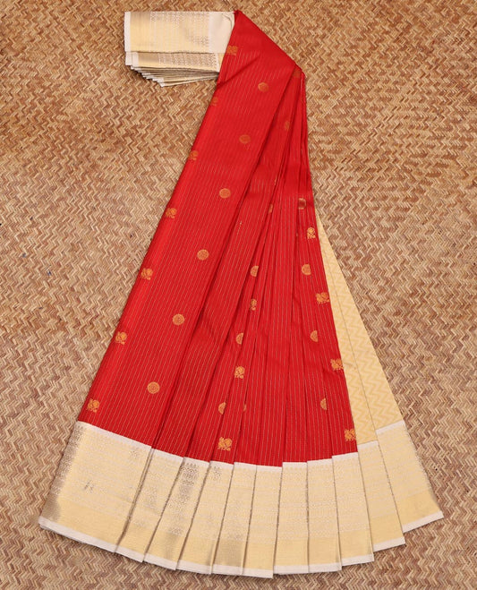 Red Budget Silk Saree, Adorned with Zari Stripes and Buttas All Over Its Body, Complemented by Contrast Traditional Zari Designs Woven Border, Chevron Striped Pallu and Paired with a Contrast Blouse