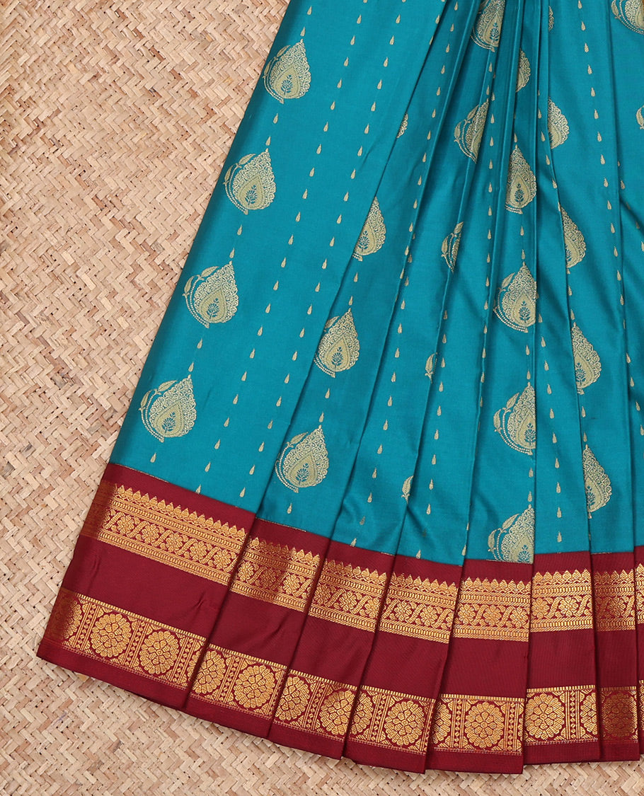 Blue Budget Silk Saree, Adorned with Zari Buttas All Over Its Body, Complemented by a Contrast Traditional Zari Design Rettai Pettu Border, Intricately Designed Pallu, and Paired with a Contrast Blouse