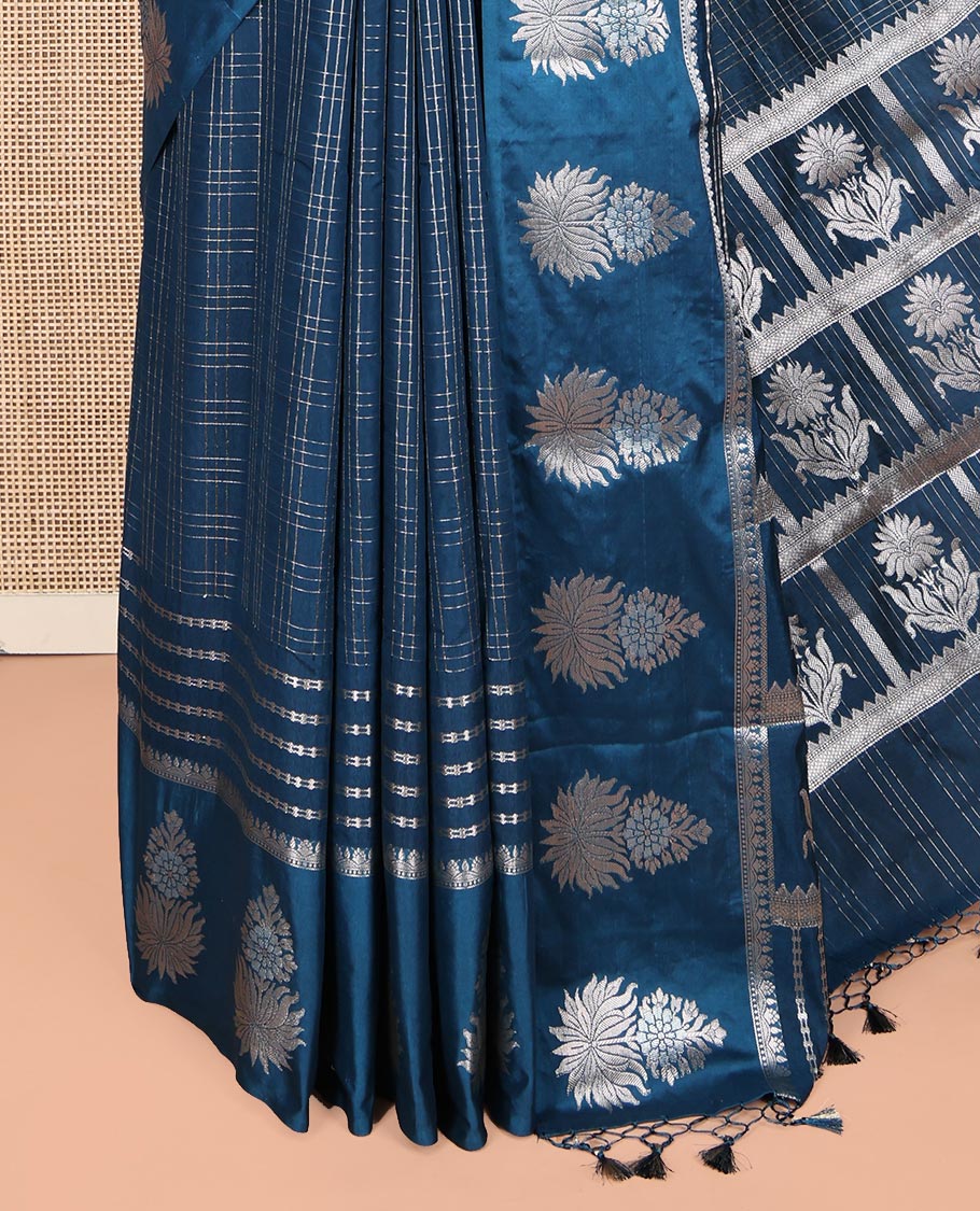 Blue Assam Silk Saree, Gleamed Up with Zari Checks, Highlighted by a Traditional Zari Border, Floral Butta Enclosed Checks Pallu, and a Matching Blouse