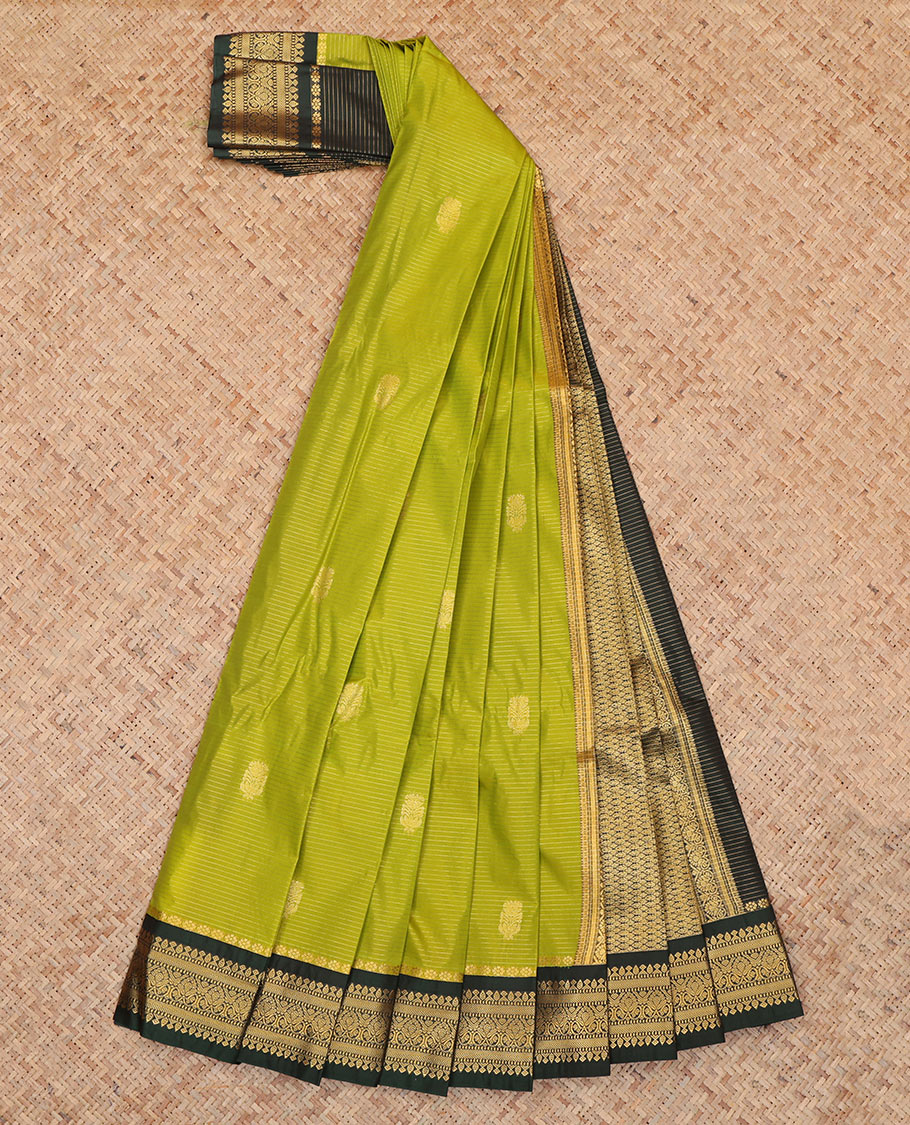 Green Budget Silk Saree, Adorned with Zari Buttas and Stripes, Complemented by Contrast Traditional Zari Border, a Grand Pallu and a Contrast Blouse
