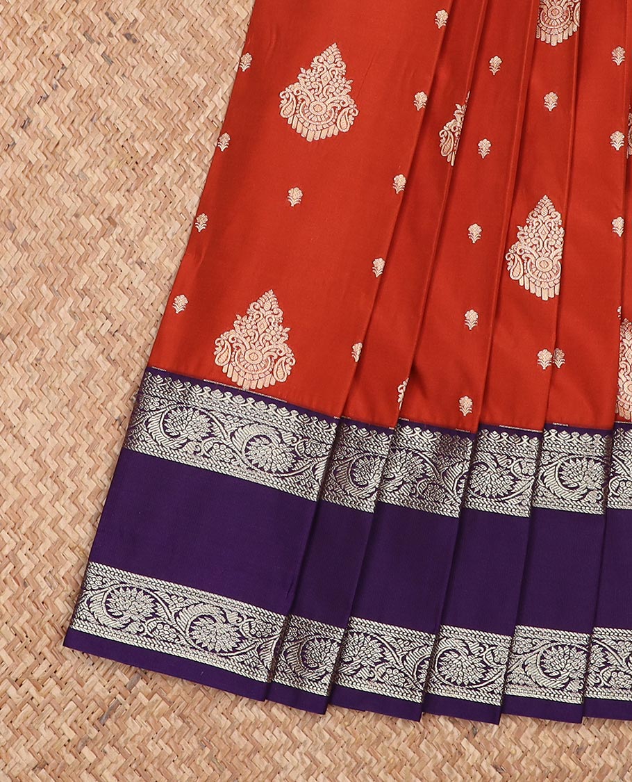 Rust zari buttas gift saree, contrast floral creeper rettai pettu border, and pallu of paisleys, and jaal designs
