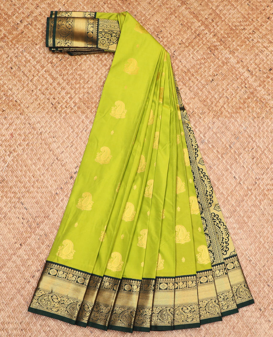 Green paisley zari buttas gift saree, contrast traditional zari border, and pallu of paisleys