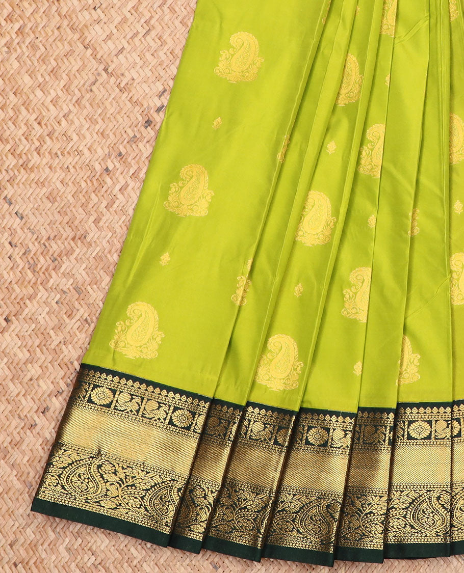 Green paisley zari buttas gift saree, contrast traditional zari border, and pallu of paisleys