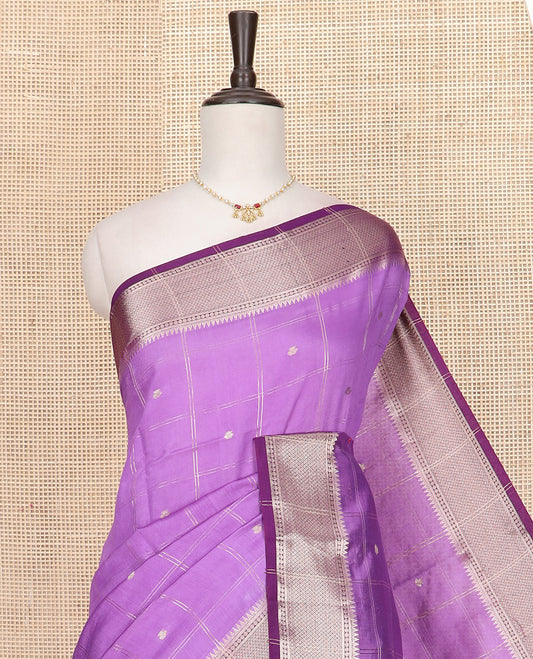 Purple Assam Silk Saree Elevated with Butta Enclosed Checks, Complemented by Contrast Traditional Zari Border, Gleaming Pallu of Zari Designs, and Paired with a Contrast Blouse