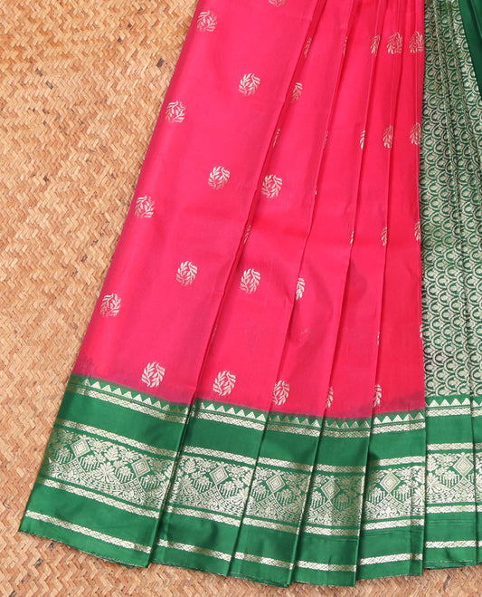 Dark Pink Budget Silk Saree, Adorned with Buttas All Over Its Body, Complemented by a Contrast Traditional Zari Design Border, Pallu Elevated with Scallop Designs, and Paired with a Contrast Blouse