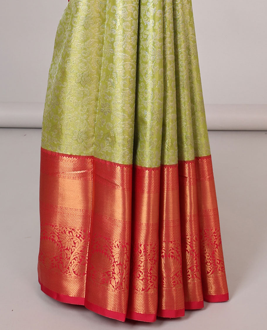Green jacquard budget silk saree with contrast traditional saree & floral buttas , striped pallu