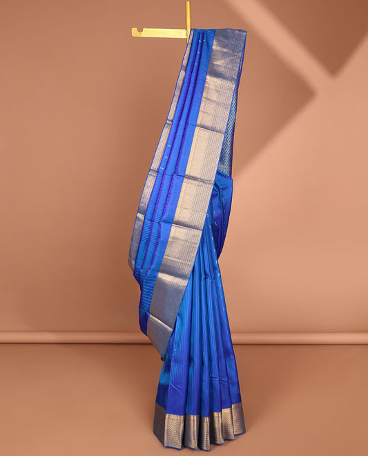 Blue striped Bangalore silk saree with buttas, zari border & pallu steeped with traditional motifs