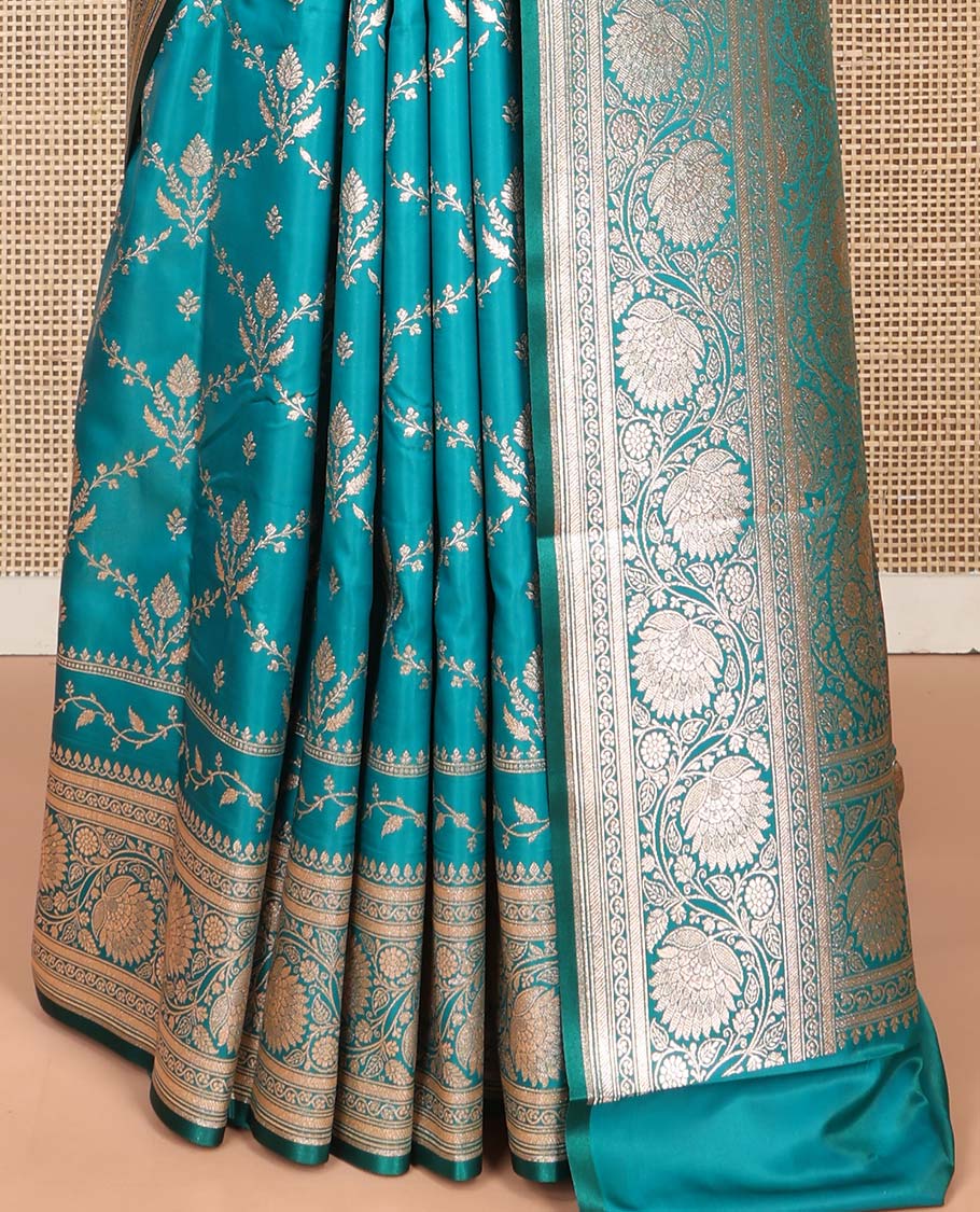 Blue Semi-Banaras Saree, Richly Detailed with Jaal Jacquard on Its Body, Highlighted by Floral Creeper Design Border, Intricately Designed Pallu, and Paired with a Contrast Blouse