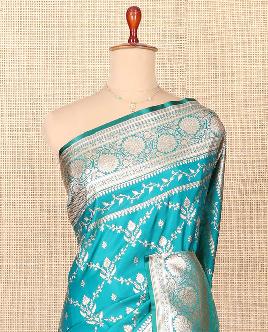 Blue Semi-Banaras Saree, Richly Detailed with Jaal Jacquard on Its Body, Highlighted by Floral Creeper Design Border, Intricately Designed Pallu, and Paired with a Contrast Blouse