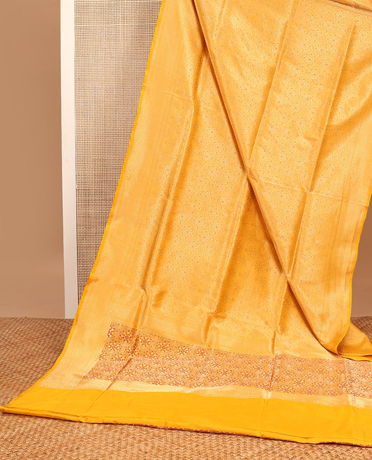 Yellow floral jacquard with self intricate zari design border & floral zari design pallu