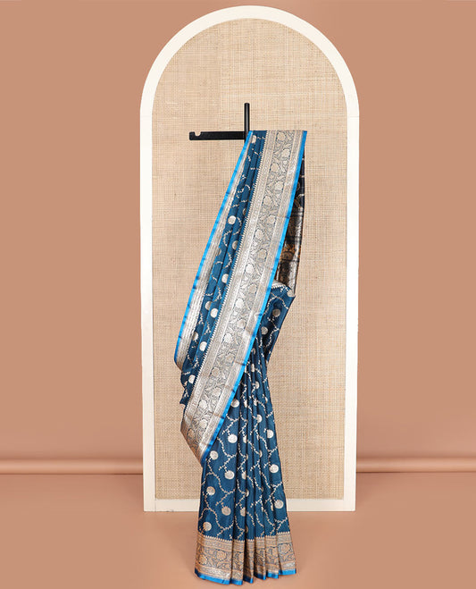 Blue floral jaal jacquard banarasi silk saree, floral creeper design border, and intricate ogee patterned pallu