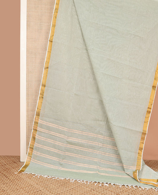 Pale green plain jute cotton saree, zari bavanji border, and striped pallu