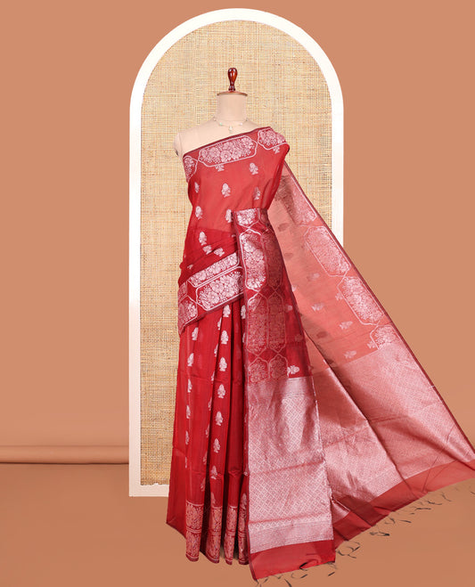 Red Semi-Silk Cotton Saree, Adorned with Zari Buttas All Over Its Body, a Subtle Border of Floral Designs, Grand Jaal Pallu, and Paired with a Matching Blouse