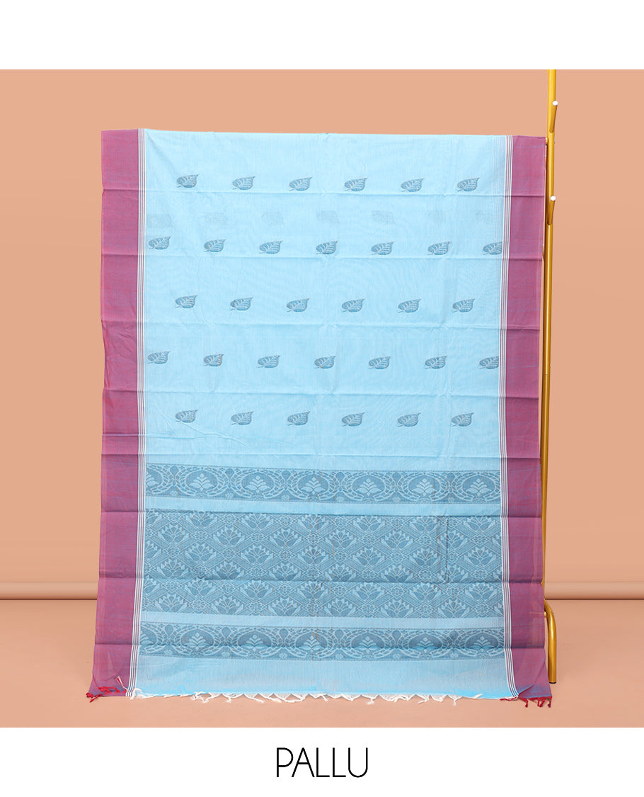 Blue Kanchi Cotton Saree, Adorned with Leaf Buttas On Its Body, Complemented by a Contrast Border, Intricate Patterned Pallu, and a Matching Blouse
