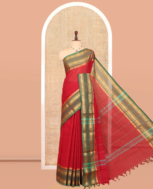 Red Plain Chettinad Cotton Saree, Complemented by a Contrast Rettai Pettu Traditional Temple Border, a Striped Pallu, and a Matching Blouse