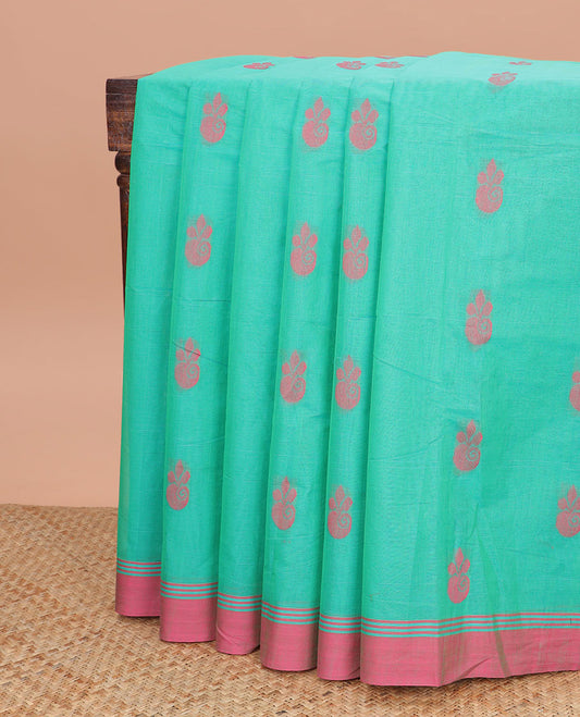 Sea green floral motifs kanchi cotton saree with contrast plain norder & floral design pallu