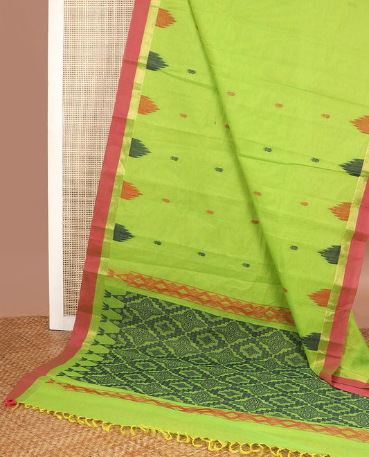 Light green motifs kanchi cotton saree with contrast temple border & checked floral design pallu