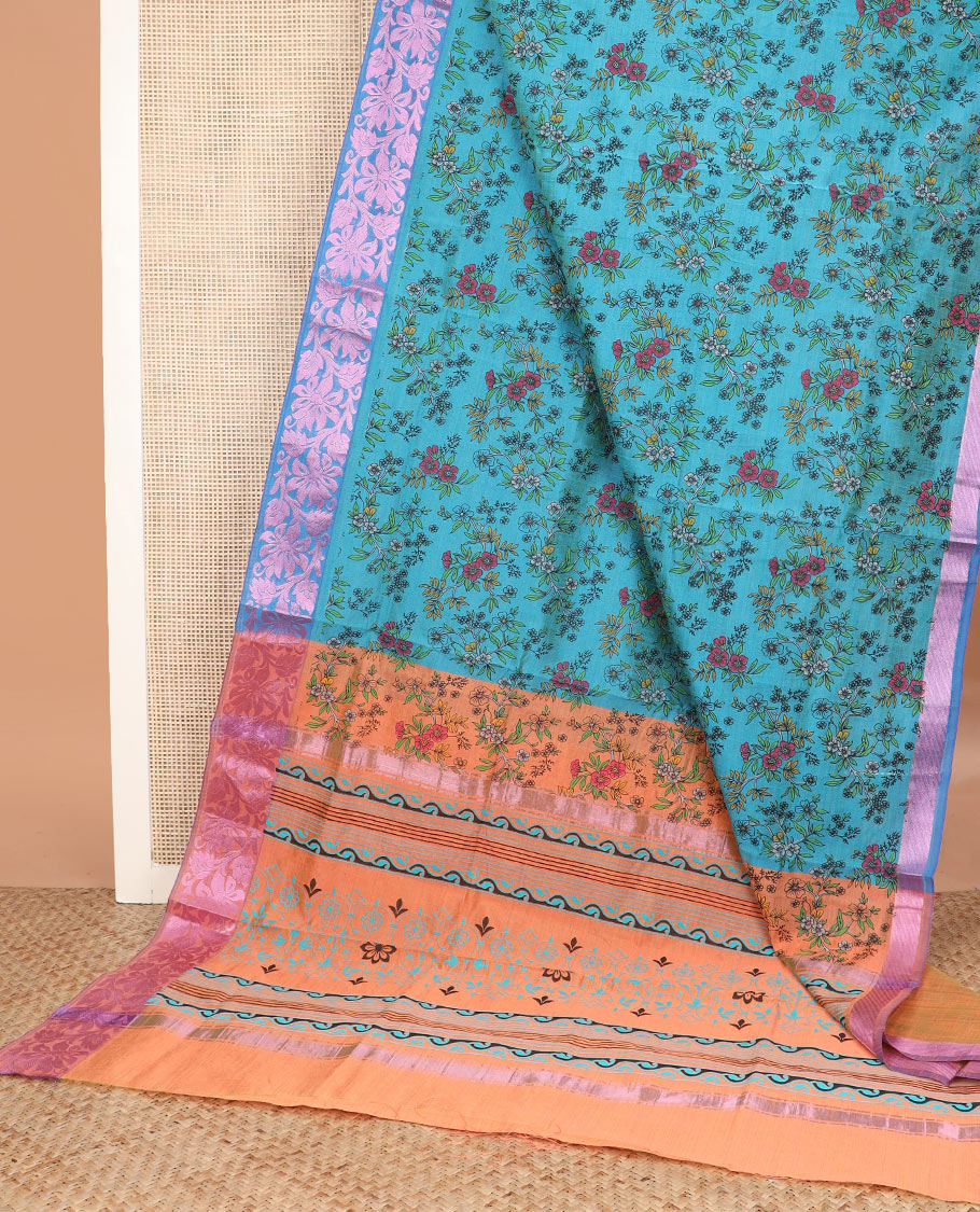 Blue floral vine printed Andhra cotton saree, contrast floral creeper zari border, and contrast printed pallu