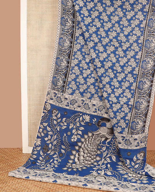 Blue floral motifs machine-printed kalamkari cotton saree, contrast bird motifs printed border, and pallu of kalamkari peacock motifs