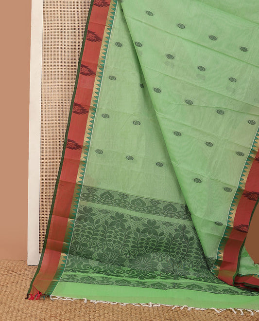 Green circle motifs kanchi cotton saree, contrast zari temple border of peacock designs & floral design pallu