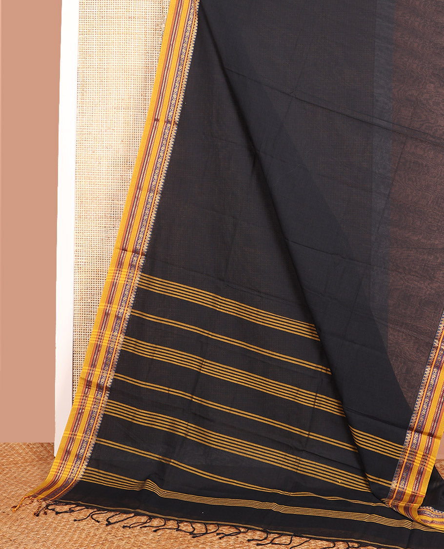 Black Plain Khadi Cotton Saree, Complemented by Contrasting Border of Traditional Designs, Subtly Striped Pallu, and Paired with a Matching Blouse