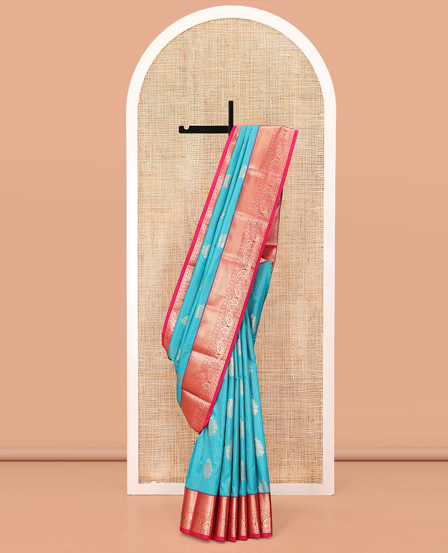 Peacock Green and Rani Pink Budget Silk Saree, Embellished with Vaira Oosi Stripes and Zari Buttas All Over Its Body, Complemented by Contrast Traditional Zari Designs Woven Border of Paisleys, Grand Pallu and Paired with a Contrast Blouse