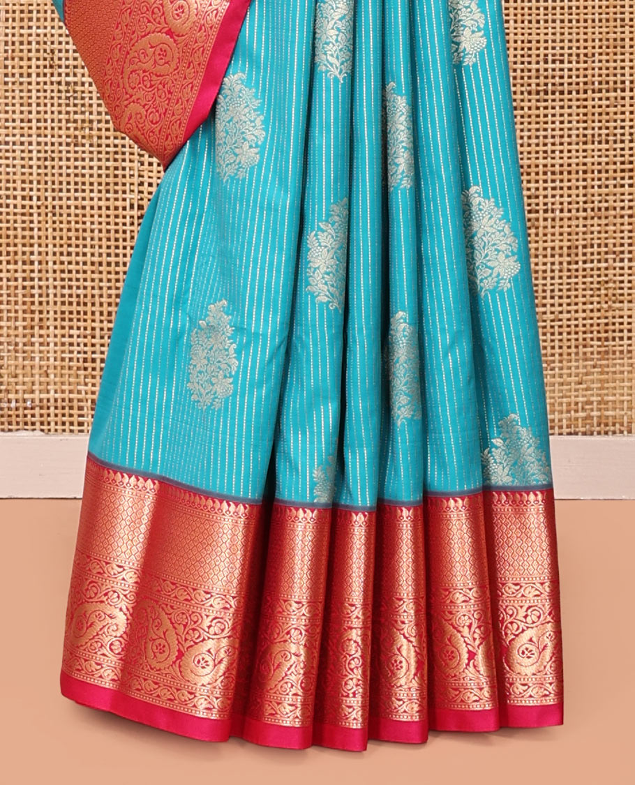 Peacock Green and Rani Pink Budget Silk Saree, Embellished with Vaira Oosi Stripes and Zari Buttas All Over Its Body, Complemented by Contrast Traditional Zari Designs Woven Border of Paisleys, Grand Pallu and Paired with a Contrast Blouse