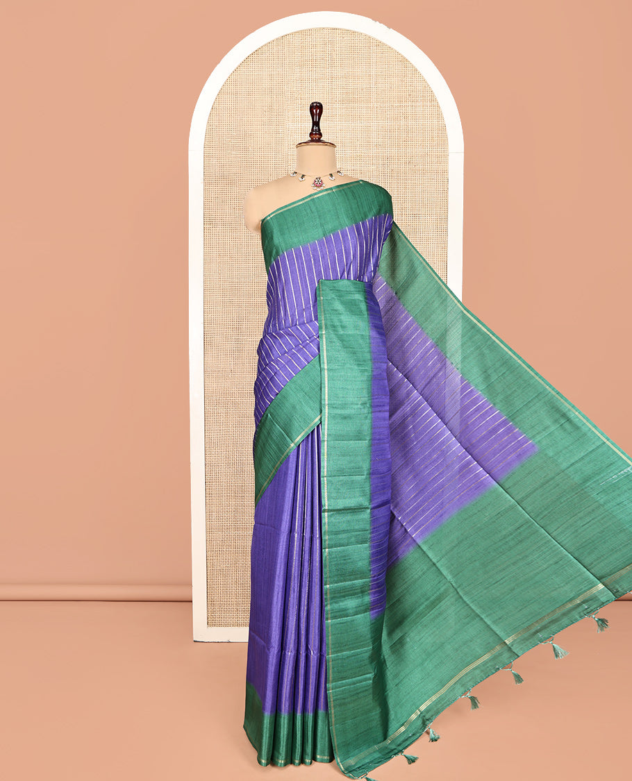 Blue Fancy Tussar Saree, Highlighted by Vertical Zari Stripes Across Its Body, Complemented by Captivating Contrast Geometric Patterned Border, Subtle Pallu and Paired with a Contrast Blouse