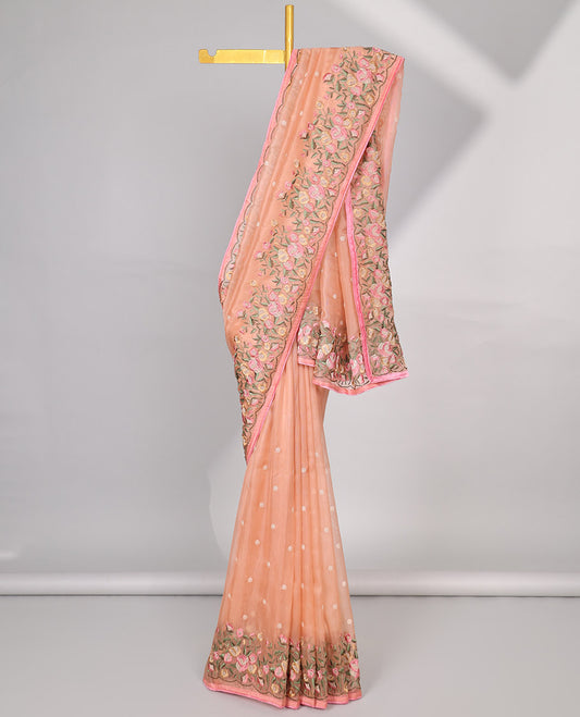 Orange motifs embroidery net designer saree with self floral border & floral embroidery pallu 