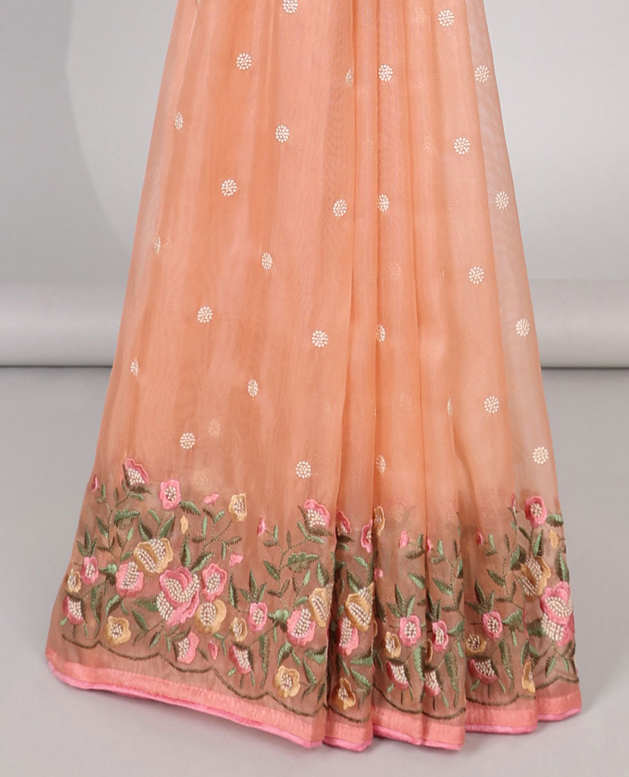 Orange motifs embroidery net designer saree with self floral border & floral embroidery pallu 