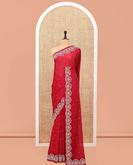 Red Designer Saree, Beautified with Stone Work On Its Body, Highlighted by Intricately Stone Work Border, and Paired with a Matching Blouse
