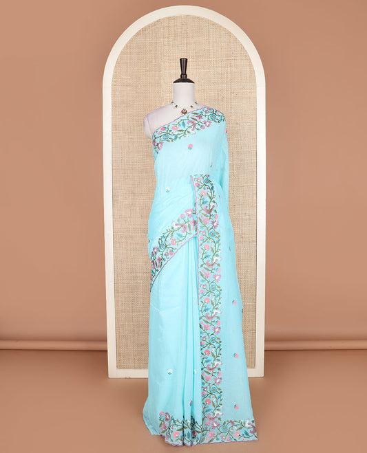 Blue floral motifs embroidered with stone work designer saree, scallop floral vine and bird embroidered border
